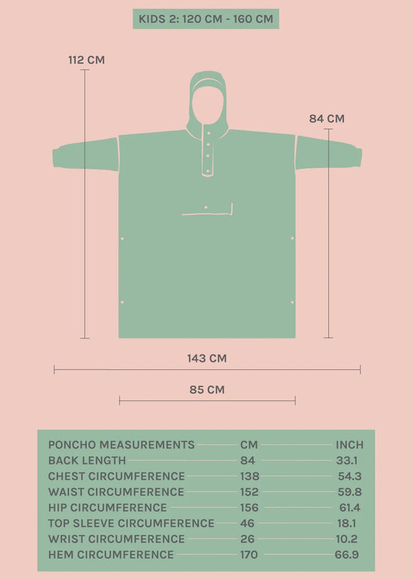 Green poncho with measurements on a pink background
